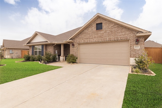 single story home with a front yard and a garage