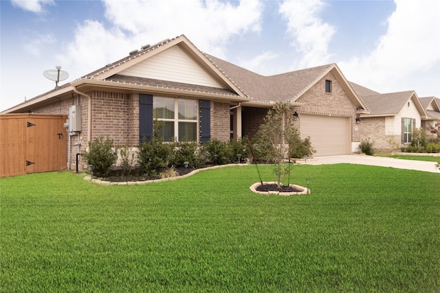 view of front of property with a garage and a front yard