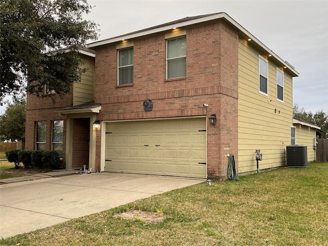 front of property featuring central AC unit, a front yard, and a garage