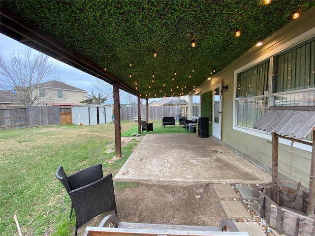 view of patio featuring a storage shed