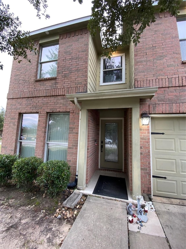 property entrance featuring a garage