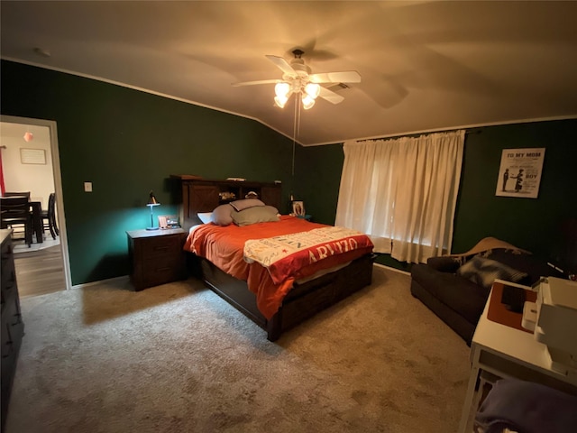 carpeted bedroom featuring ceiling fan and lofted ceiling