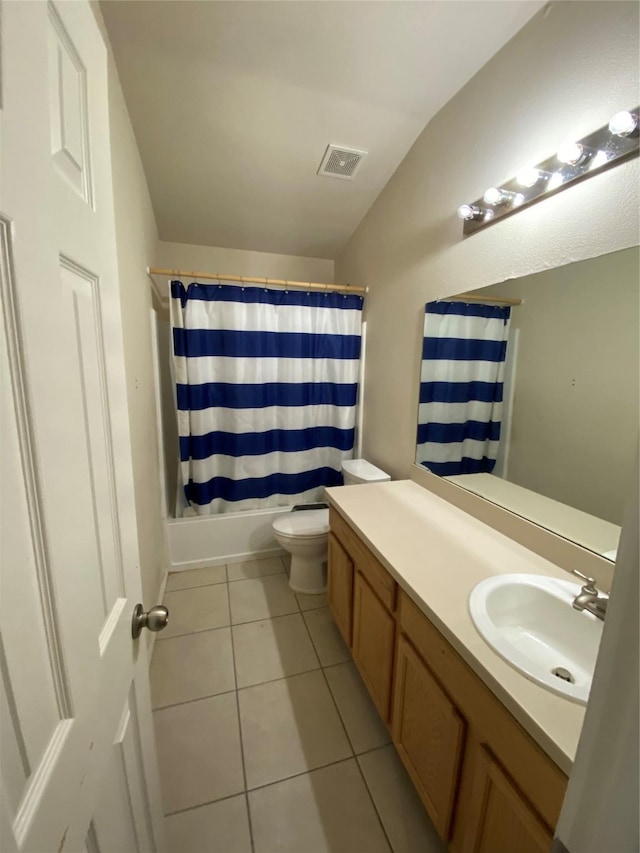 full bathroom with shower / bath combo, tile patterned floors, vanity, toilet, and lofted ceiling