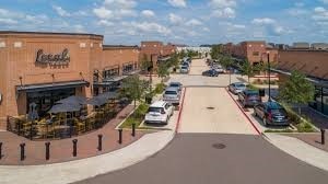 view of road featuring curbs and sidewalks