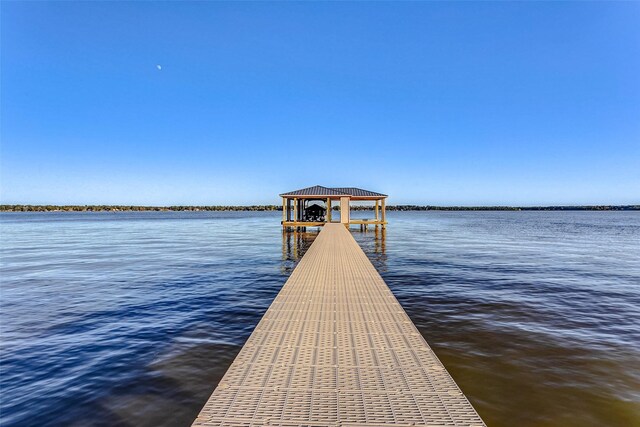 view of dock with a water view