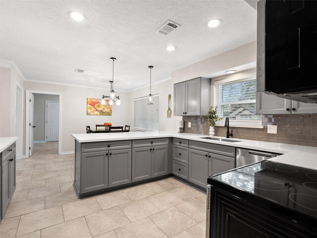 kitchen with gray cabinets, sink, hanging light fixtures, stainless steel dishwasher, and kitchen peninsula