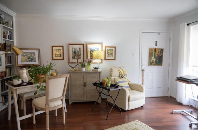 office with dark hardwood / wood-style floors, ornamental molding, and a wealth of natural light