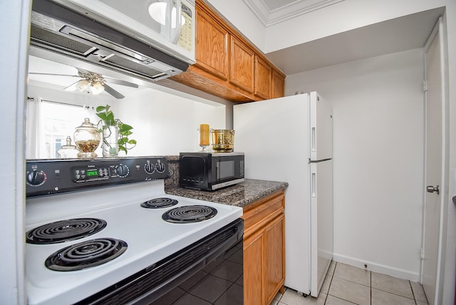 kitchen featuring light tile patterned floors, white appliances, ceiling fan, and ornamental molding