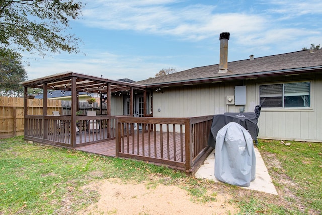 back of property featuring a wooden deck