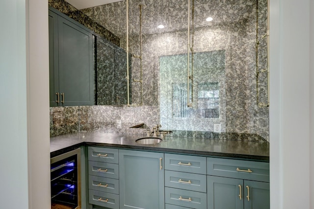 bar with tasteful backsplash, sink, and beverage cooler