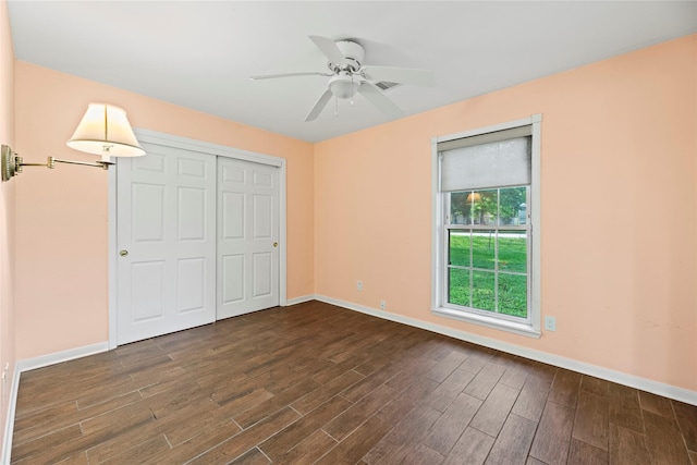 unfurnished bedroom featuring a closet and ceiling fan