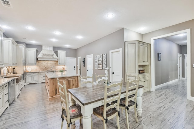 dining room with light hardwood / wood-style floors