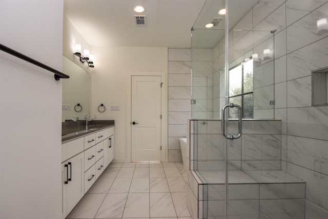 bathroom with vanity and walk in shower