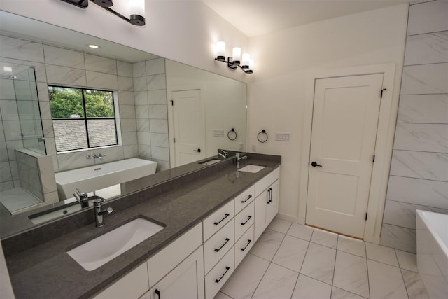 bathroom featuring vanity, shower with separate bathtub, and tile walls