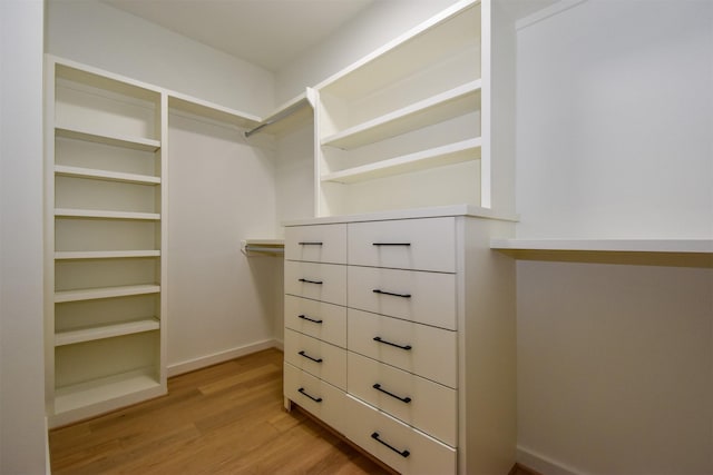 walk in closet featuring light wood-type flooring