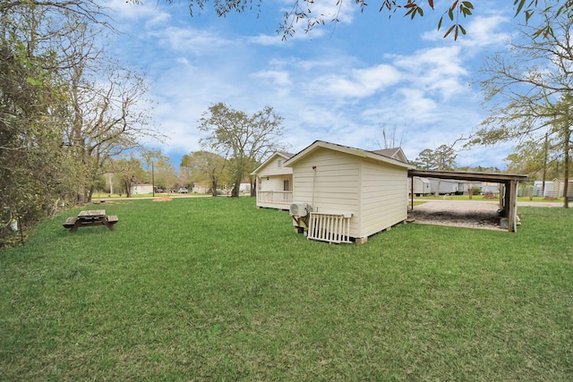 view of yard with a carport