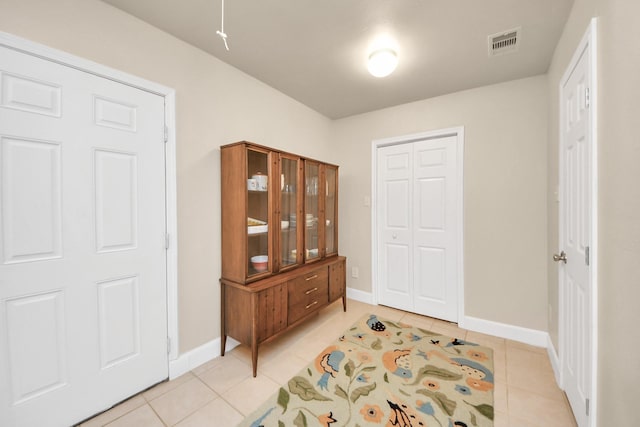 view of tiled foyer entrance