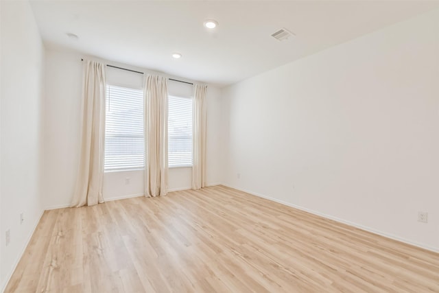 empty room featuring light hardwood / wood-style floors