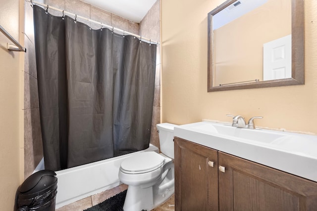 full bathroom featuring tile patterned flooring, vanity, shower / bath combination with curtain, and toilet