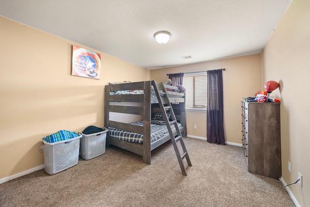 bedroom with light carpet