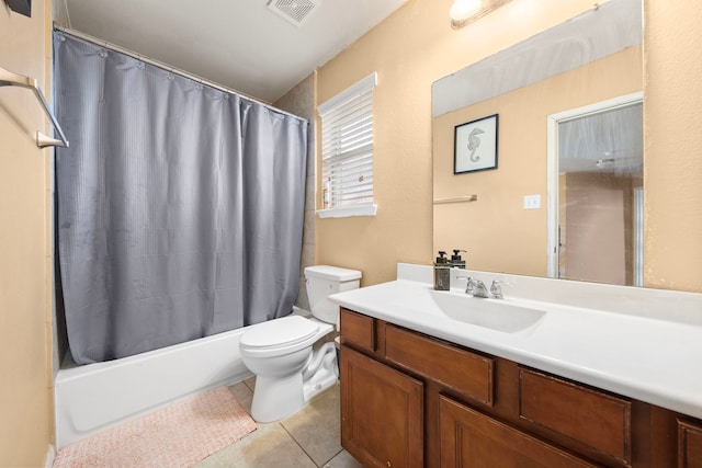 full bathroom featuring tile patterned flooring, vanity, toilet, and shower / tub combo