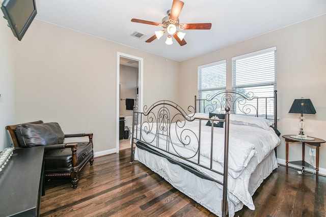 bedroom with ceiling fan and dark hardwood / wood-style floors