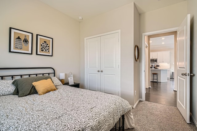 carpeted bedroom featuring a closet