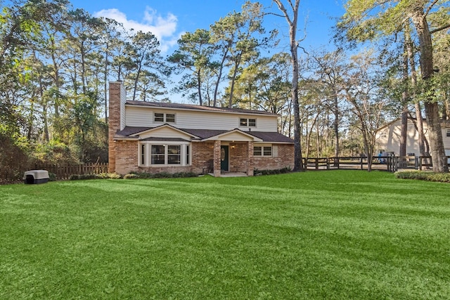 view of front of home with a front yard