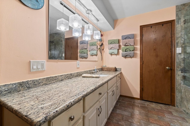 bathroom with vanity and an enclosed shower