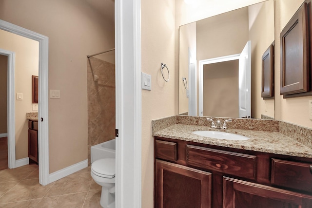 full bathroom with tile patterned floors, vanity, toilet, and tub / shower combination