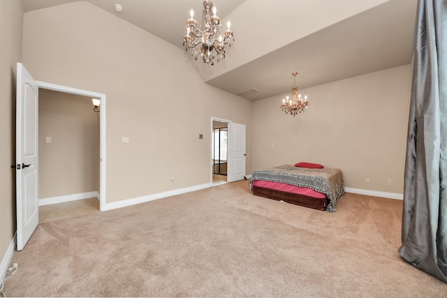 bedroom with high vaulted ceiling, an inviting chandelier, and light colored carpet