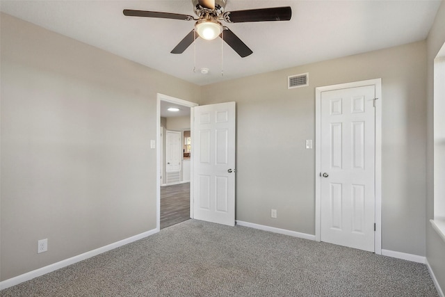 unfurnished bedroom with carpet and ceiling fan