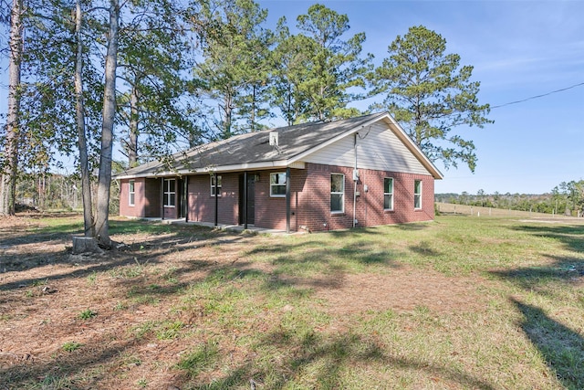 exterior space with a front yard