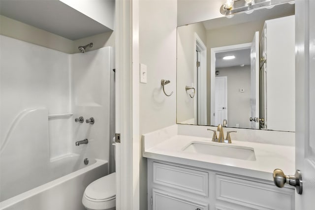 full bathroom with vanity,  shower combination, and toilet