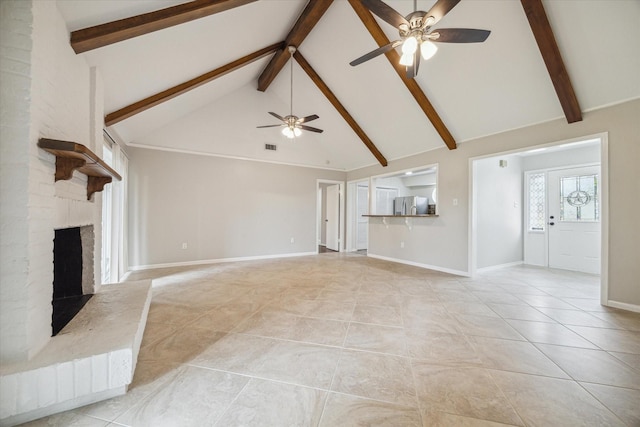 unfurnished living room featuring ceiling fan, beam ceiling, light tile patterned floors, high vaulted ceiling, and a fireplace