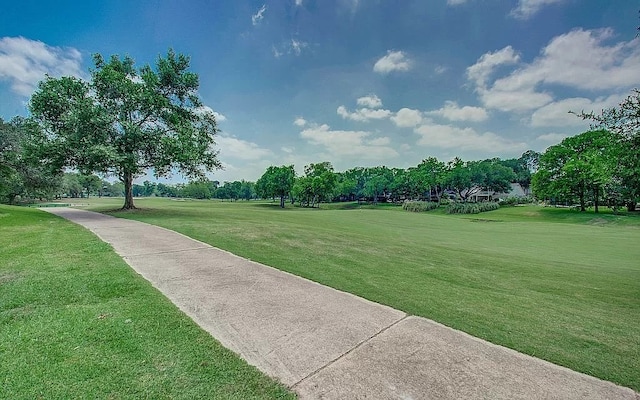 view of community with a lawn