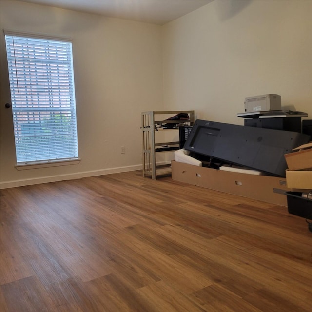 office space with hardwood / wood-style floors