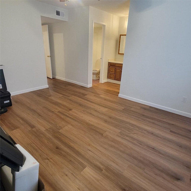 unfurnished living room featuring light hardwood / wood-style flooring