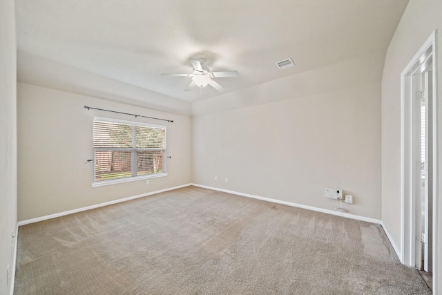 spare room with carpet flooring and ceiling fan