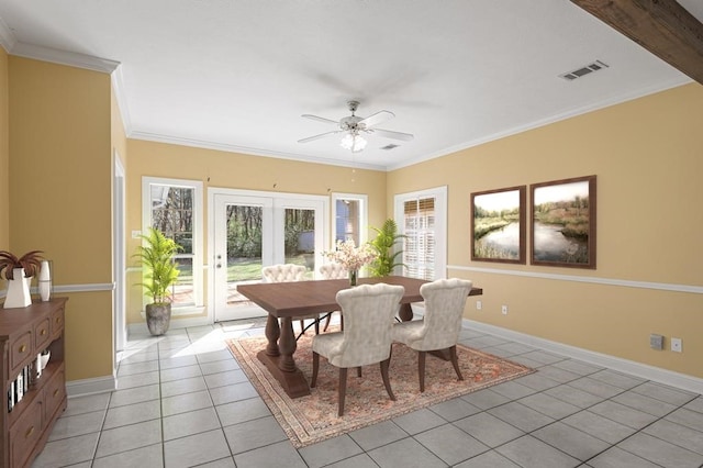 dining space with ceiling fan, light tile patterned floors, crown molding, and french doors