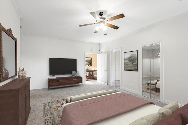 carpeted bedroom featuring ceiling fan and ornamental molding