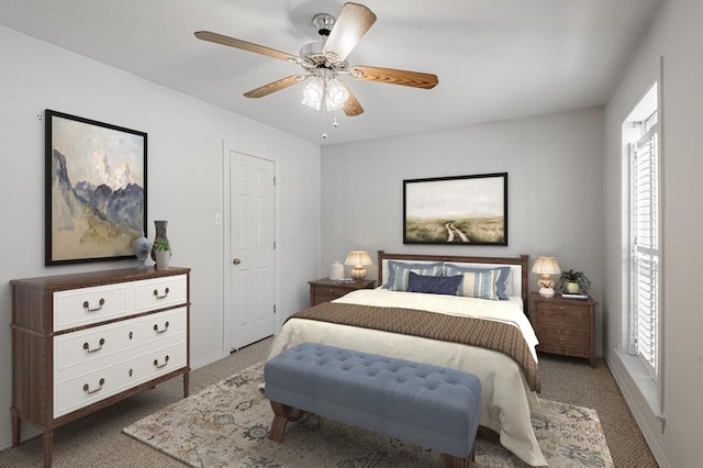 bedroom featuring dark colored carpet and ceiling fan