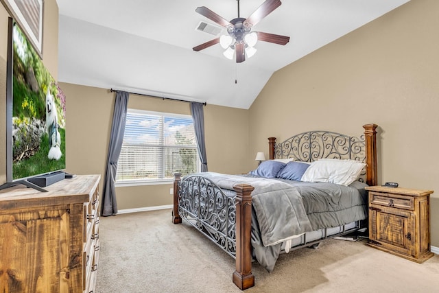 carpeted bedroom with vaulted ceiling and ceiling fan