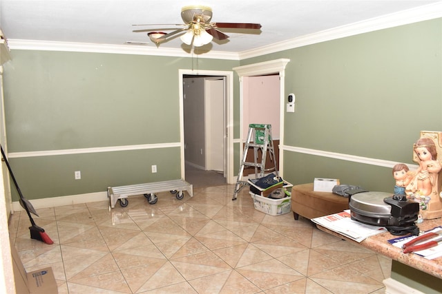 interior space with ceiling fan, light tile patterned floors, and ornamental molding