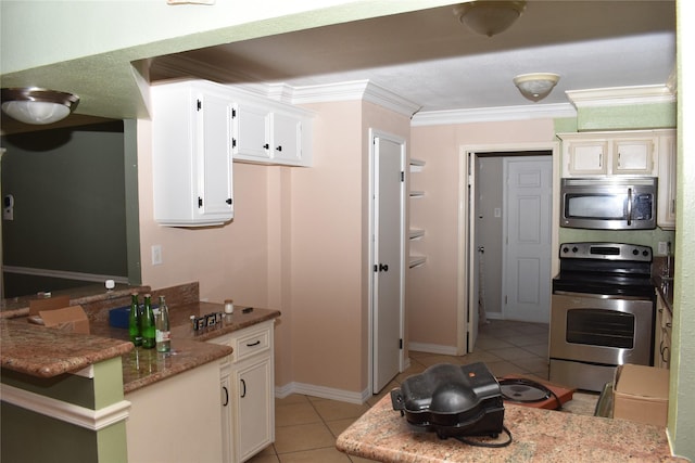 kitchen with white cabinets, light tile patterned flooring, crown molding, and stainless steel range with electric cooktop