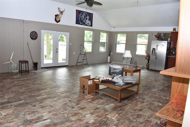 living room featuring french doors, ceiling fan, and lofted ceiling