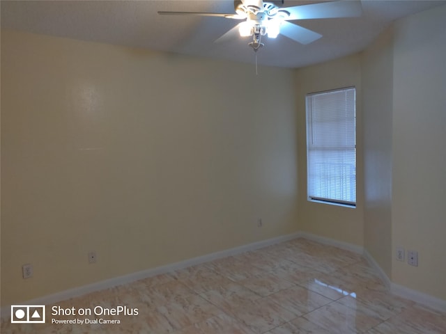 unfurnished room featuring ceiling fan