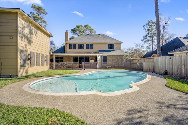 view of pool featuring a patio area