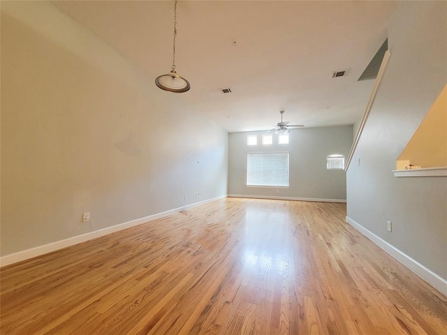 spare room featuring light hardwood / wood-style flooring and ceiling fan