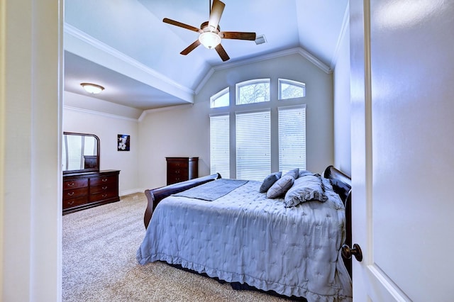 bedroom featuring carpet floors, vaulted ceiling, ceiling fan, and crown molding